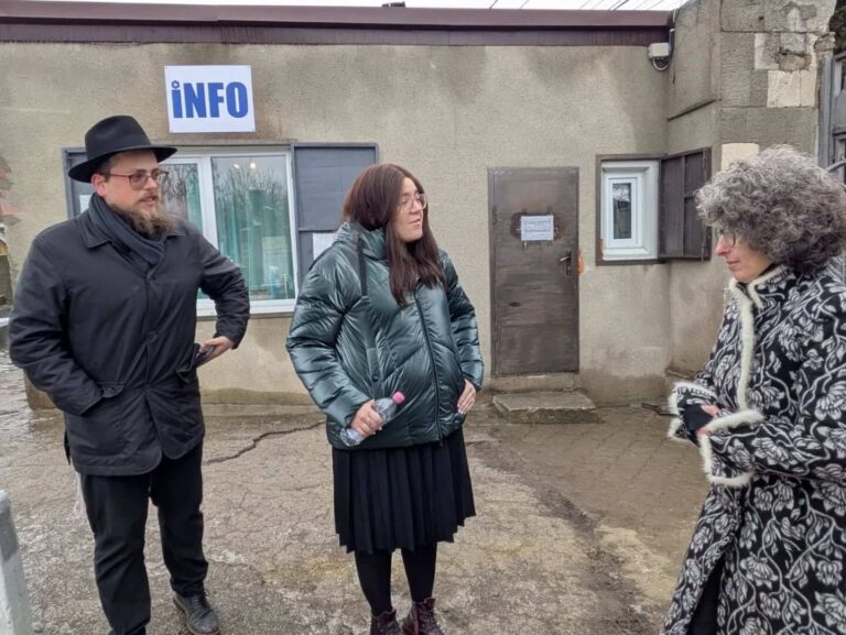 Lighting memorial candles for the 'Every Candle is a Name' initiative at Chabad Kishinev